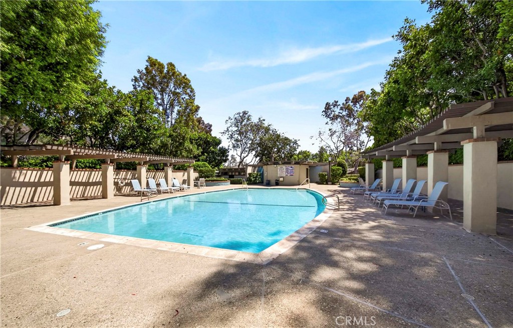 9 Madrona Irvine, CA 92612 - Photo 37 of 38 a view of a swimming pool with a patio