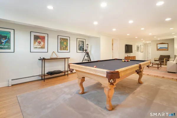 a bedroom with a bed and a table