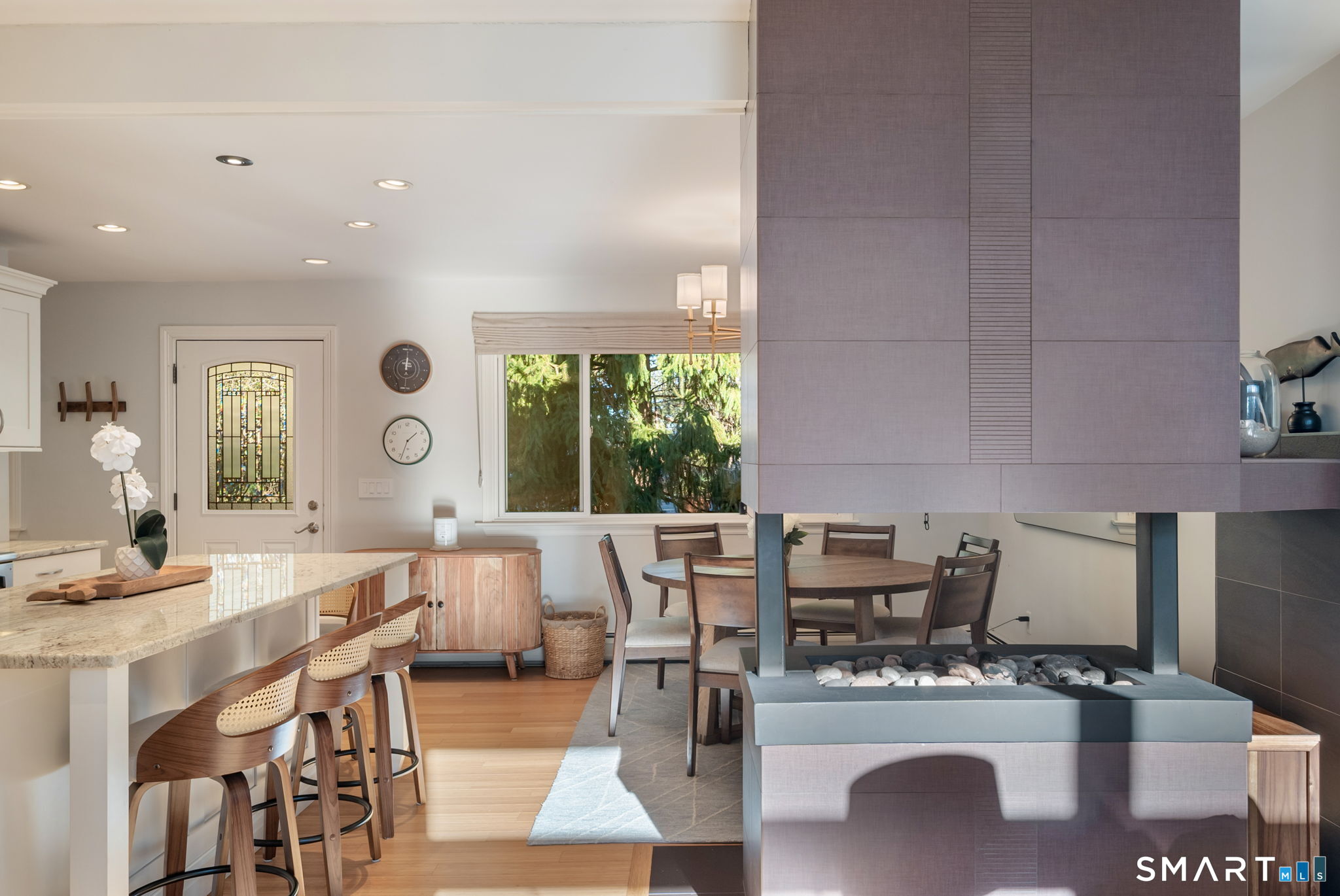 12 Splitrock Road Norwalk, CT 06854 - Photo 9 of 37 a living room with furniture and a large window