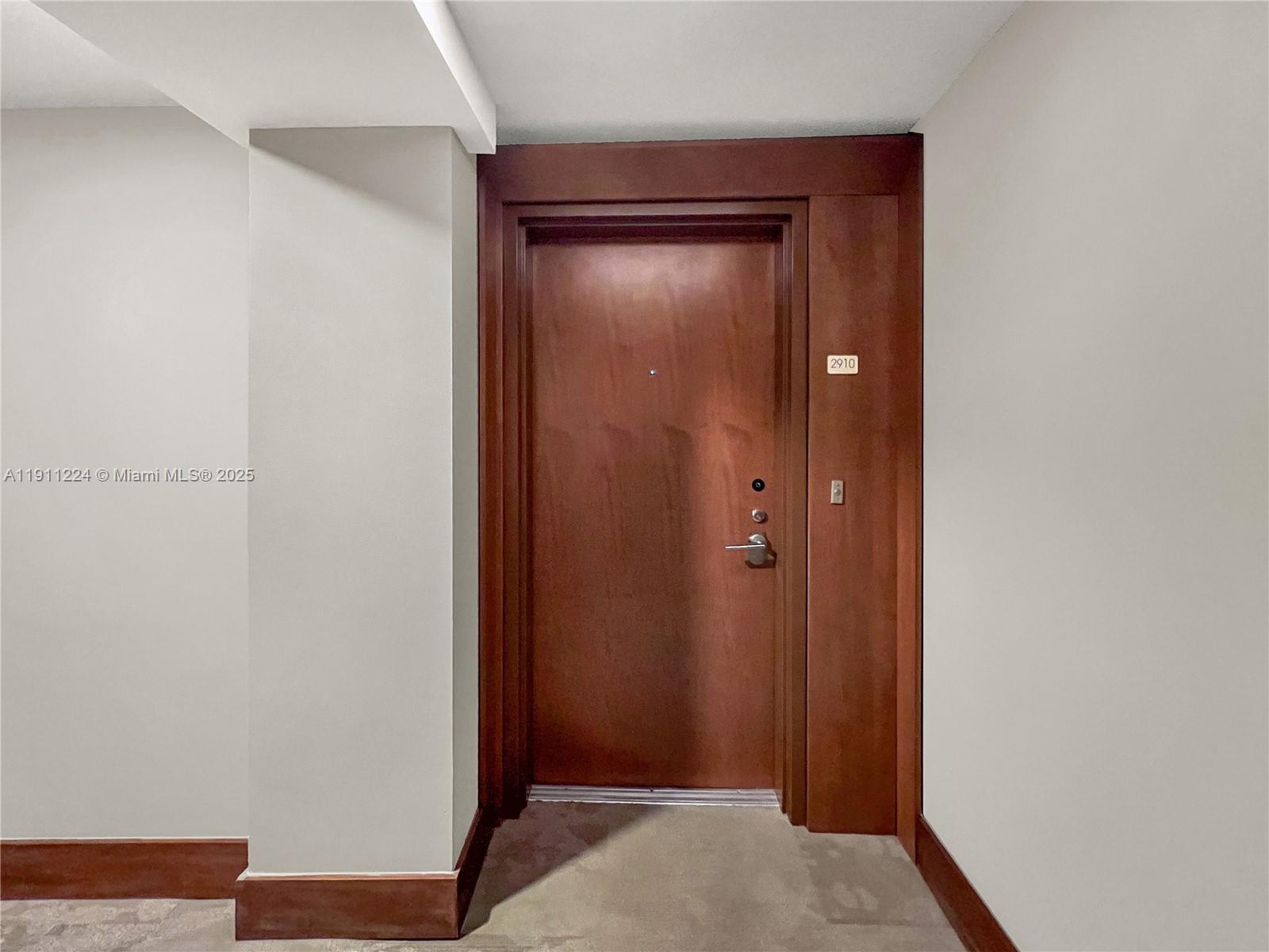 31 Southeast 5th Street, Unit 2910 Miami, FL 33131 - Photo 25 of 34 a view of elevator with wooden floor