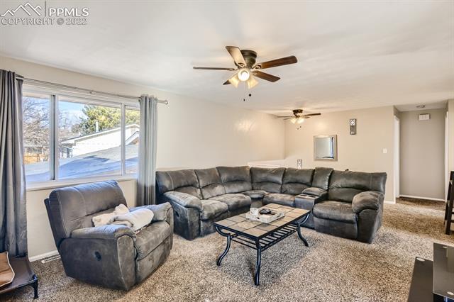 1320 Wooten Road Colorado Springs, CO 80915 - Photo 4 of 26 Spacious livingroom