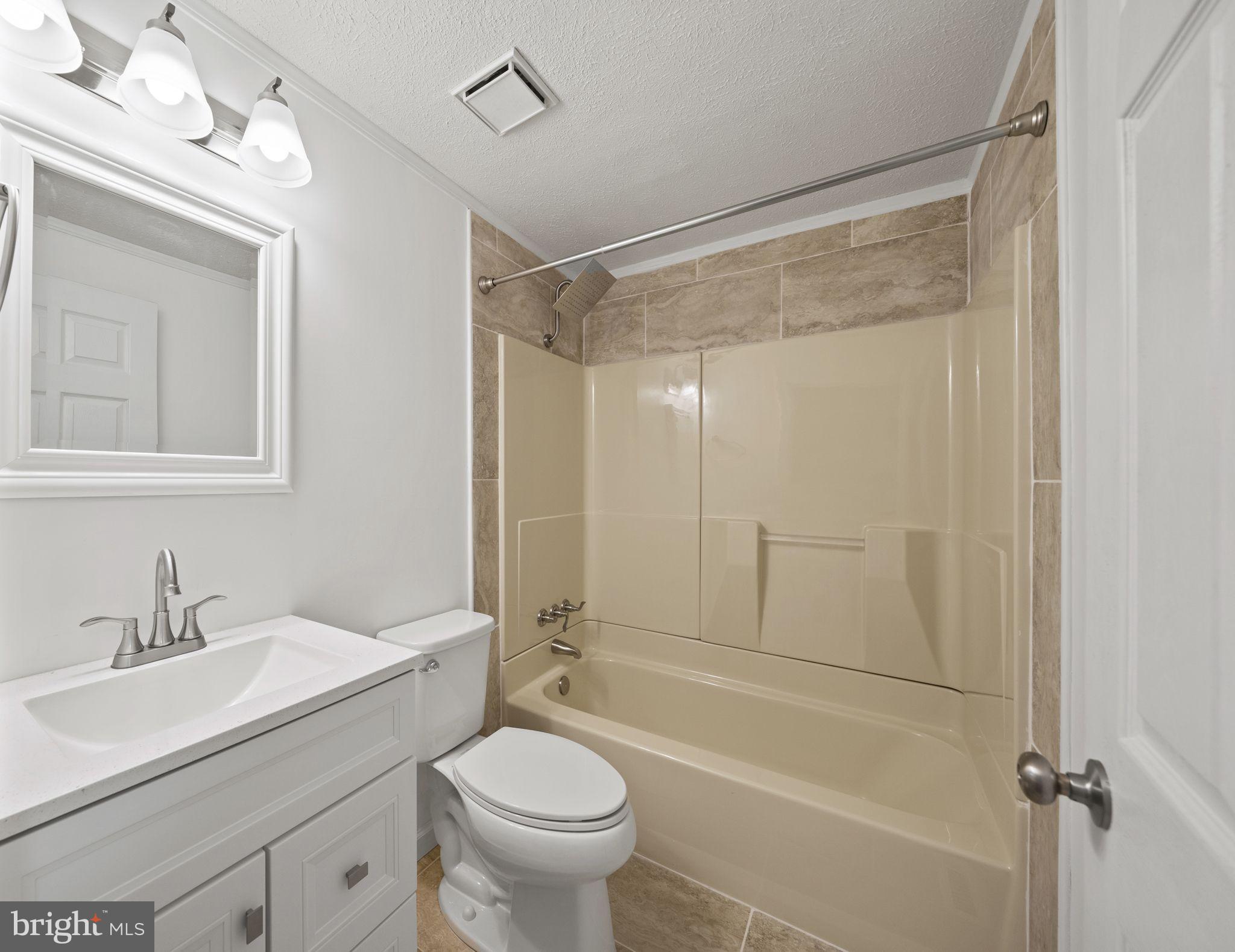 14512 Livingston Road Accokeek, MD 20607 - Photo 21 of 24 Main Bath with ceramic floor/wall