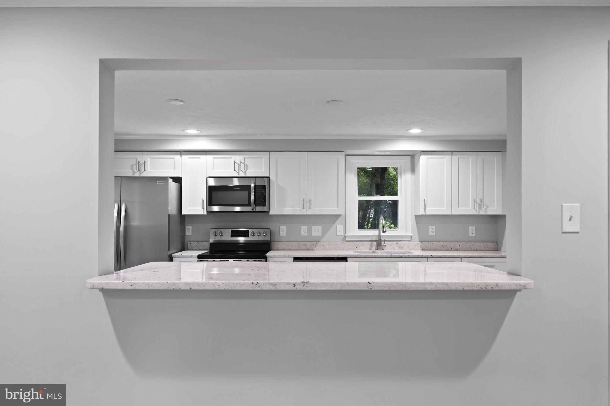 14512 Livingston Road Accokeek, MD 20607 - Photo 6 of 24 View into kitchen from living room
