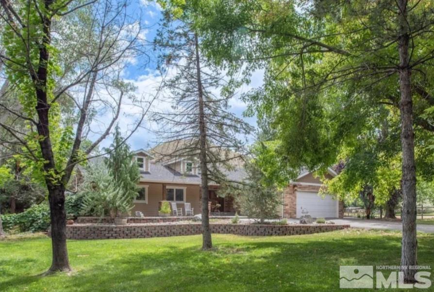 22850 Carriage Drive Reno, NV 89521 - Photo 1 of 35 a view of a house with a yard