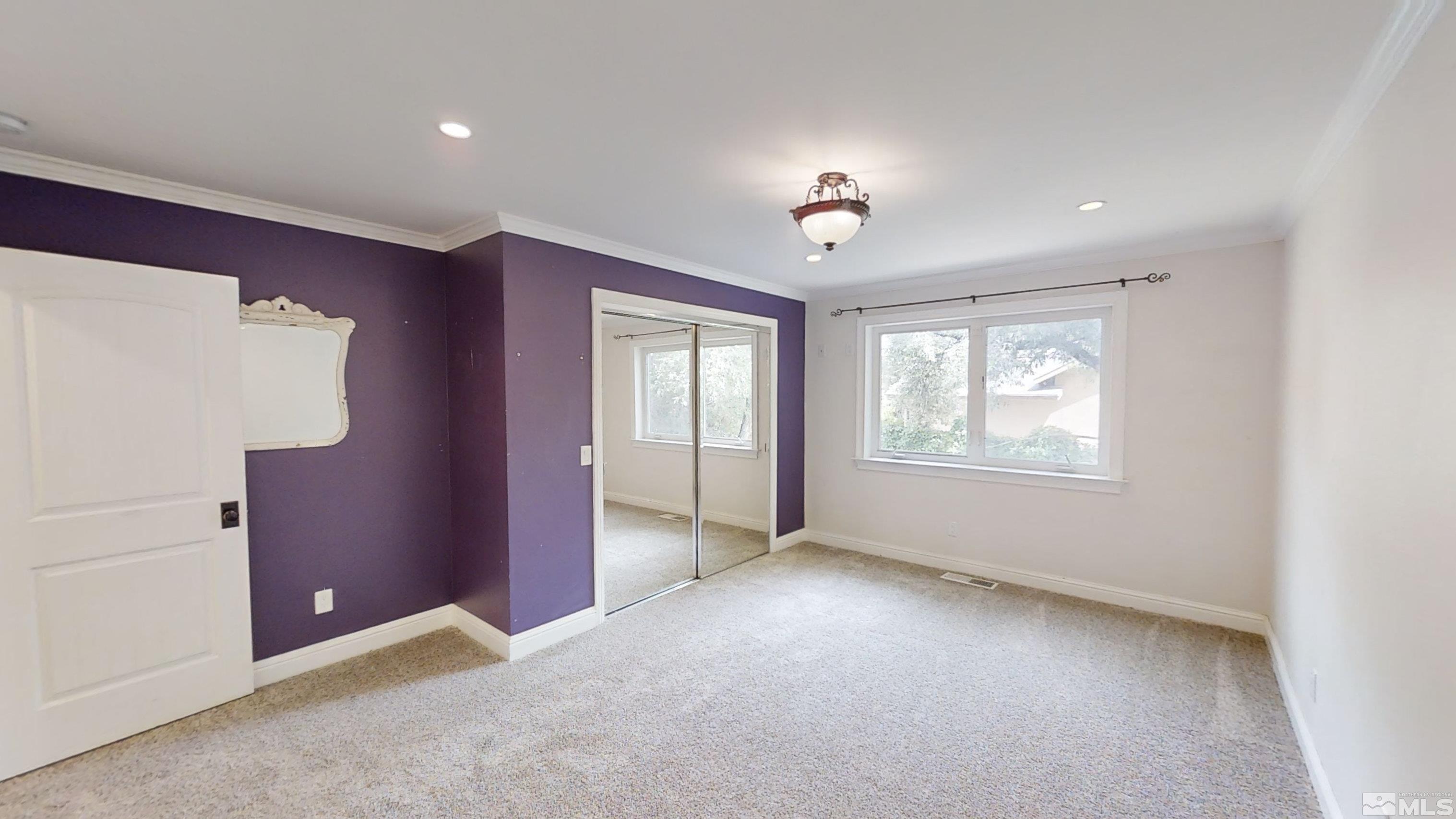 22850 Carriage Drive Reno, NV 89521 - Photo 23 of 35 an empty room with windows and closet