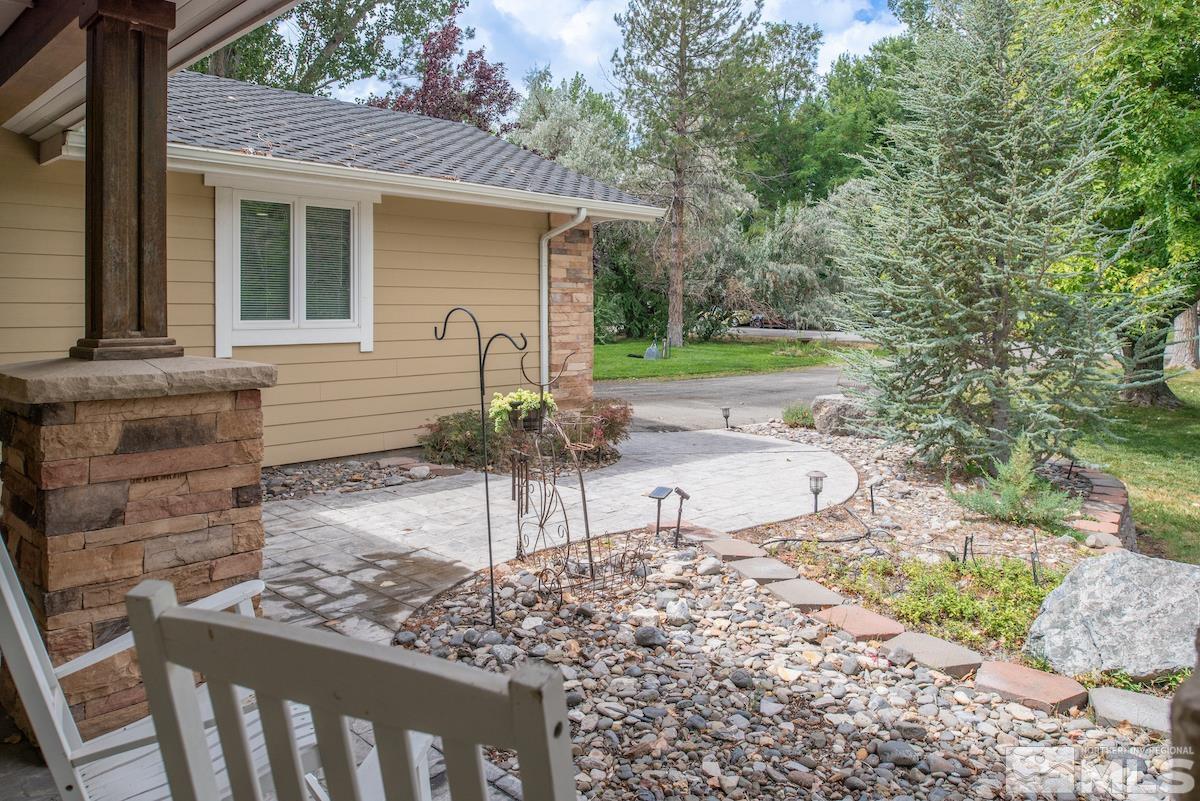 22850 Carriage Drive Reno, NV 89521 - Photo 3 of 35 a view of a house with backyard and sitting area