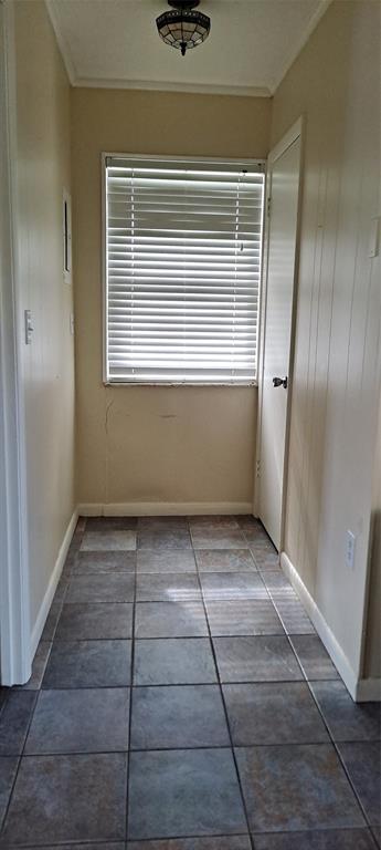 1118 Highway 441 Okeechobee, FL 34974 - Photo 7 of 11 a view of a closet area with living room