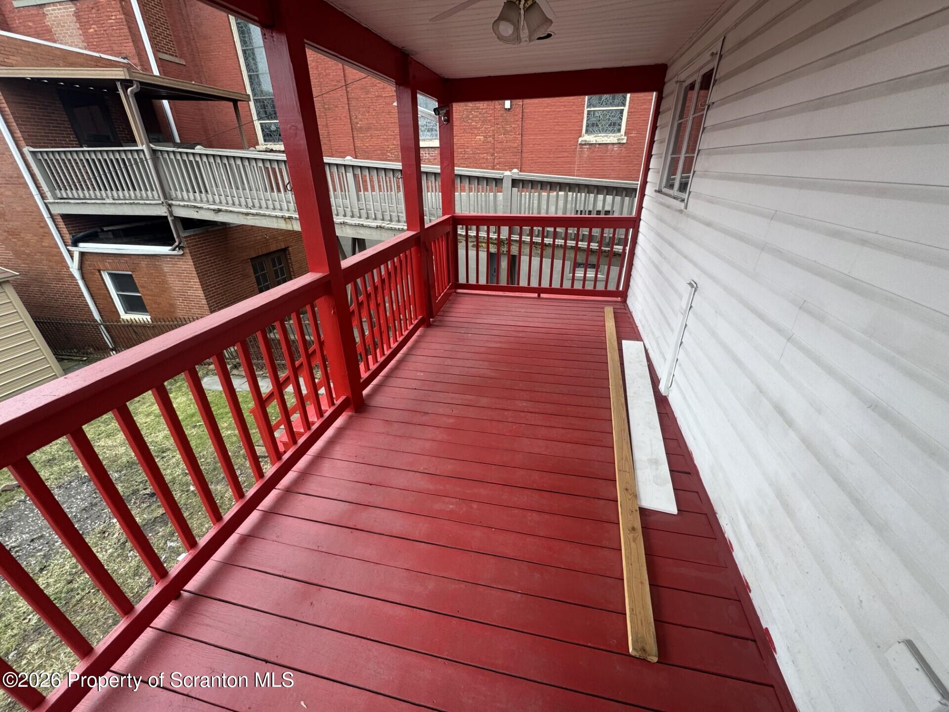 209 South Main Avenue Scranton, PA 18504 - Photo 11 of 12 a view of balcony with wooden floor