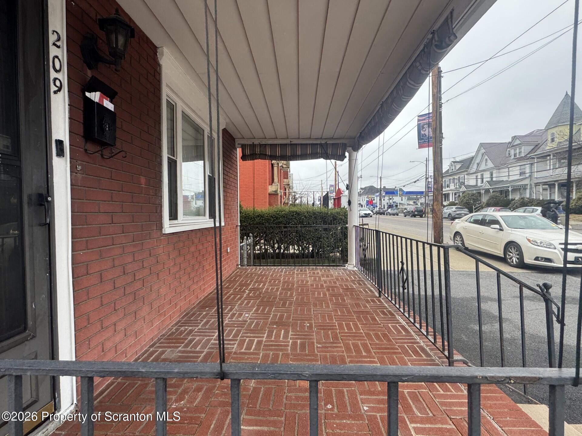 209 South Main Avenue Scranton, PA 18504 - Photo 2 of 12 a view of balcony with furniture