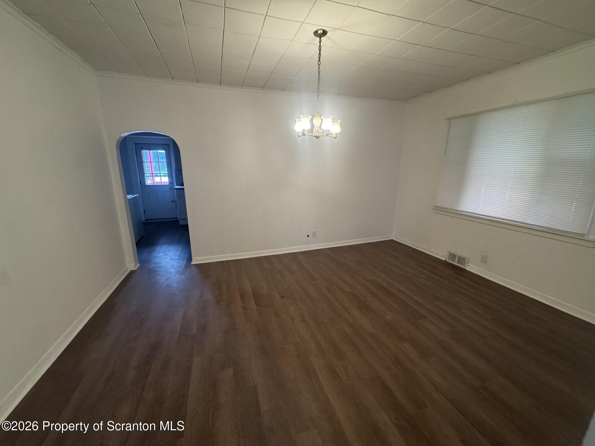 209 South Main Avenue Scranton, PA 18504 - Photo 5 of 12 a view of a room with wooden floor