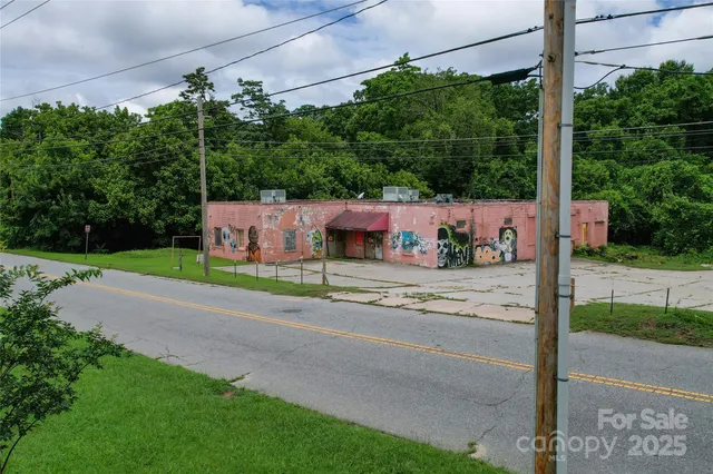 a view of street with a building in the background