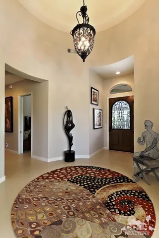 a bedroom with a bed and dresser