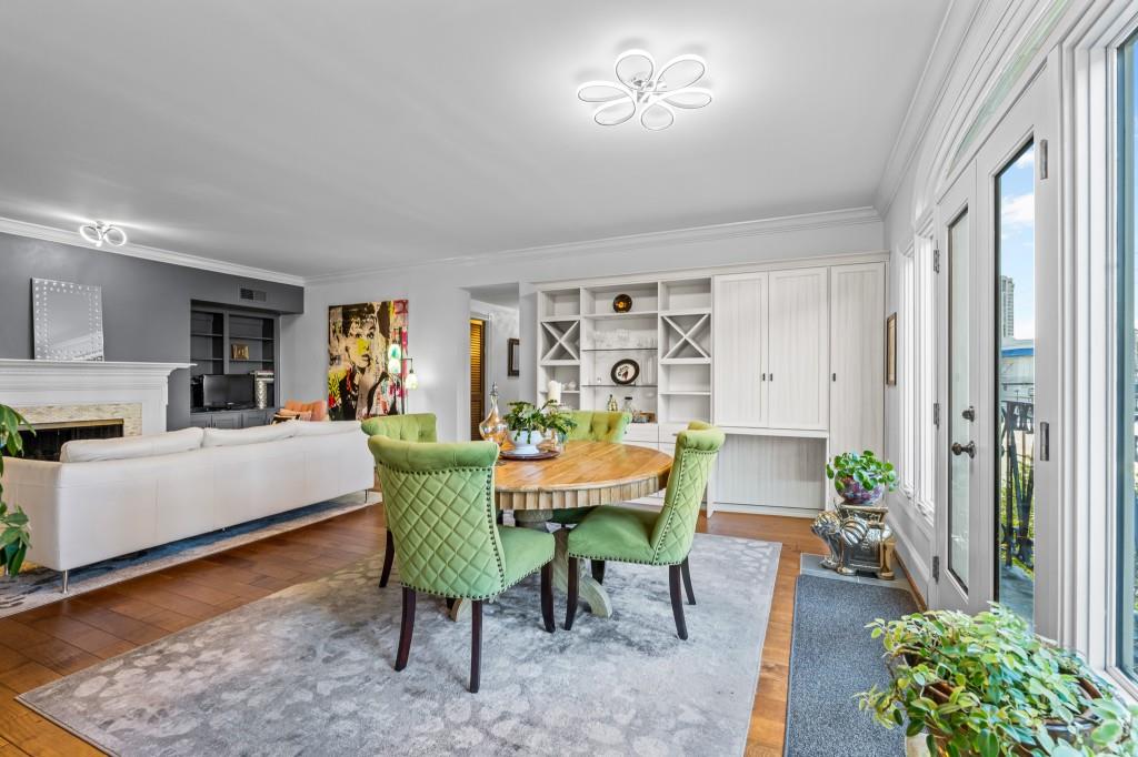 3638 Peachtree Road Northeast, Unit 406 Atlanta, GA 30319 - Photo 11 of 27 a living room with furniture and a large window