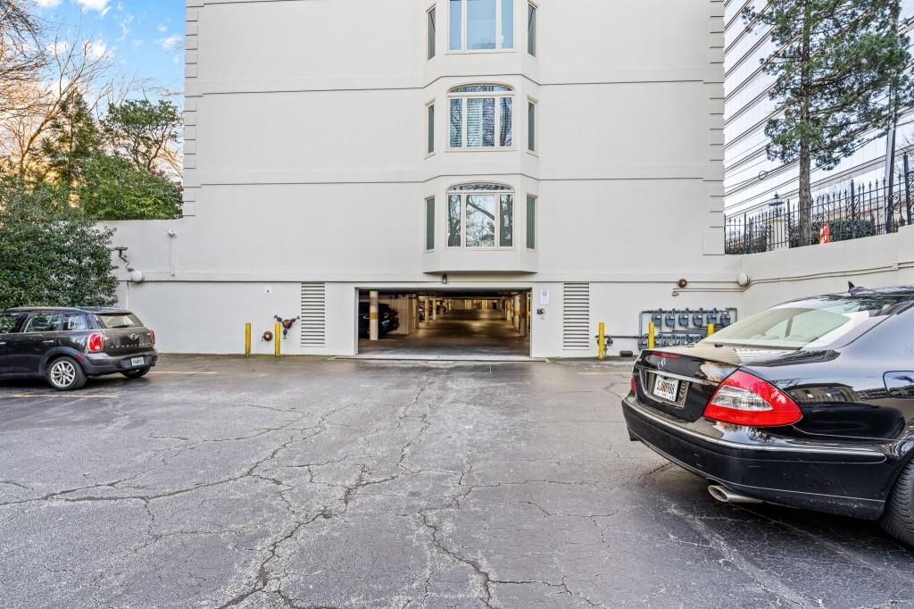 3638 Peachtree Road Northeast, Unit 406 Atlanta, GA 30319 - Photo 27 of 27 a car parked in front of a building