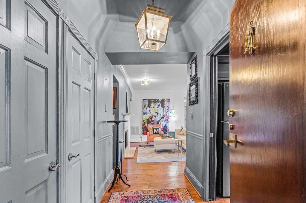3638 Peachtree Road Northeast, Unit 406 Atlanta, GA 30319 - Photo 7 of 27 a view of water heater room with a hallway