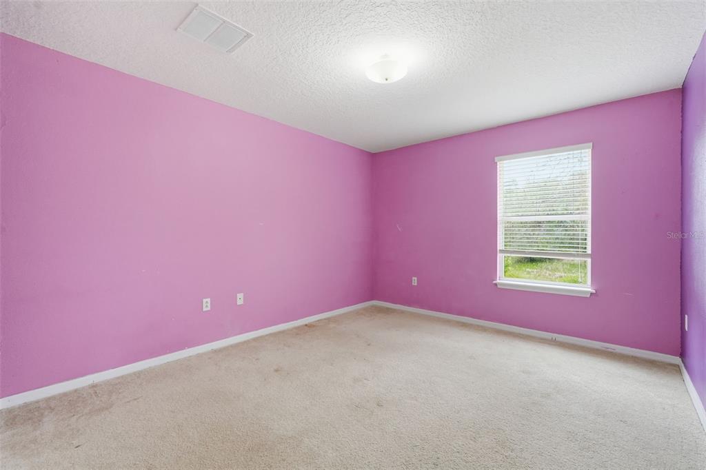 12005 Infinity Drive New Port Richey, FL 34654 - Photo 32 of 48 an empty room with windows