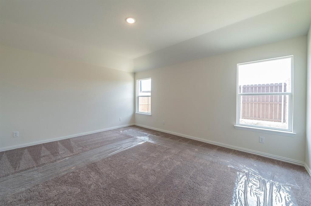 118 Goel Street Greenville, TX 75402 - Photo 5 of 12 an empty room with windows