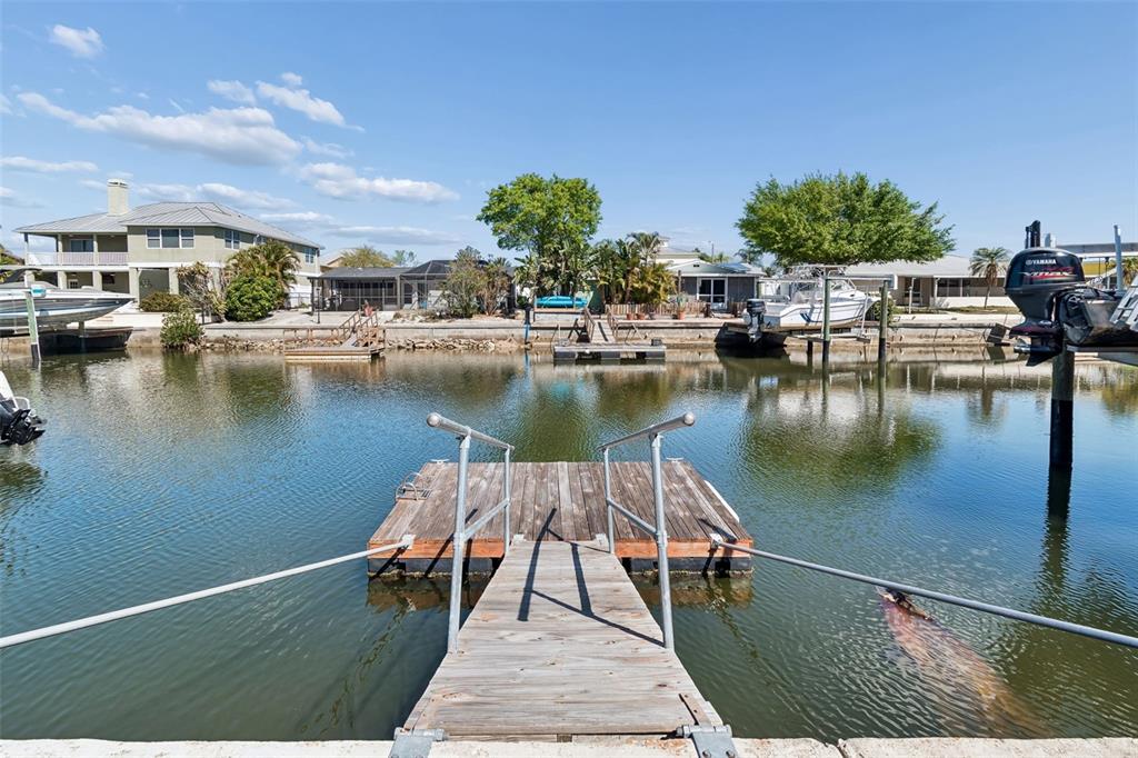 4417 Rudder Way New Port Richey, FL 34652 - Photo 21 of 47 a view of a lake with houses