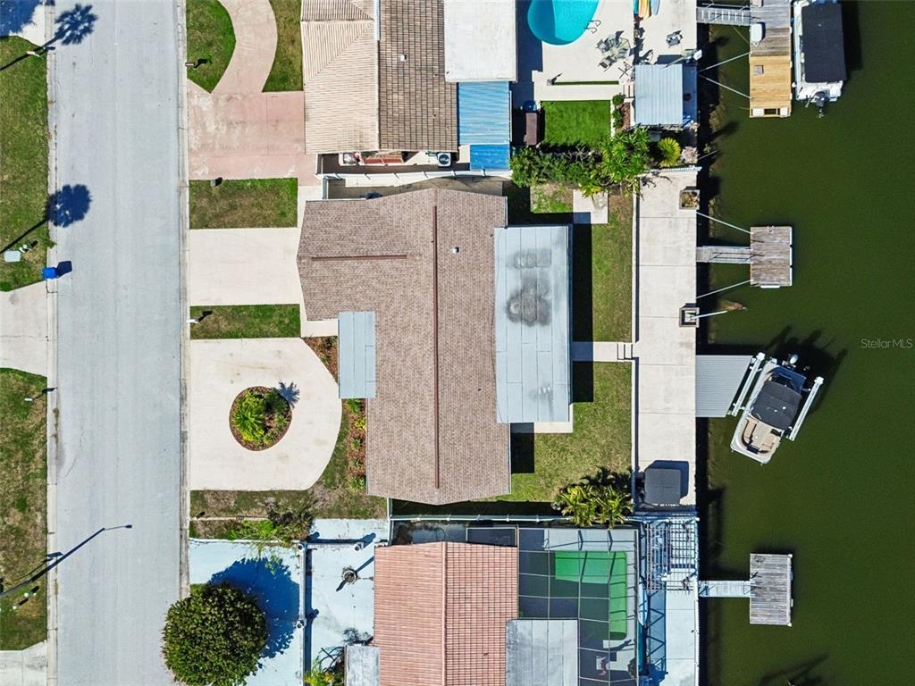 4417 Rudder Way New Port Richey, FL 34652 - Photo 22 of 47 aerial view of residential house with outdoor space and swimming pool