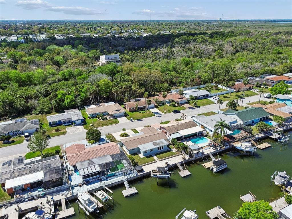 4417 Rudder Way New Port Richey, FL 34652 - Photo 30 of 47 a picture of a city with lots of residential buildings and ocean view