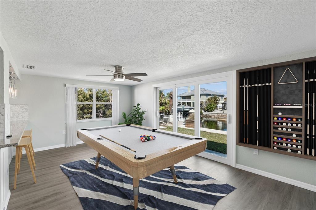 4417 Rudder Way New Port Richey, FL 34652 - Photo 4 of 47 a living room with furniture a table and large window