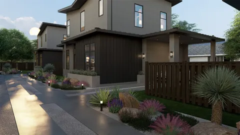 a view of a house with backyard and garden