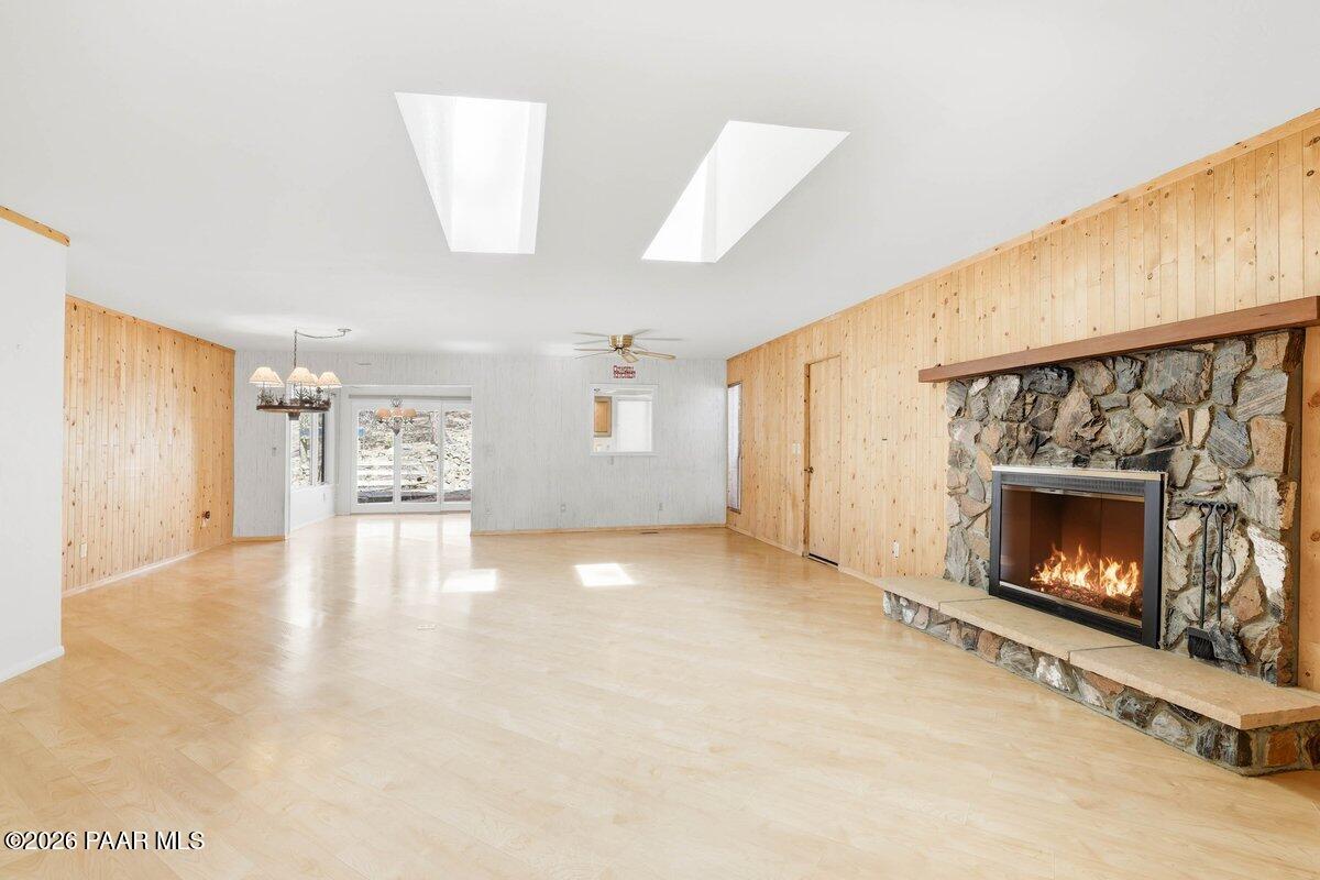 748 East Marapai Road Prescott, AZ 86303 - Photo 11 of 47 a view of an empty room with a fireplace