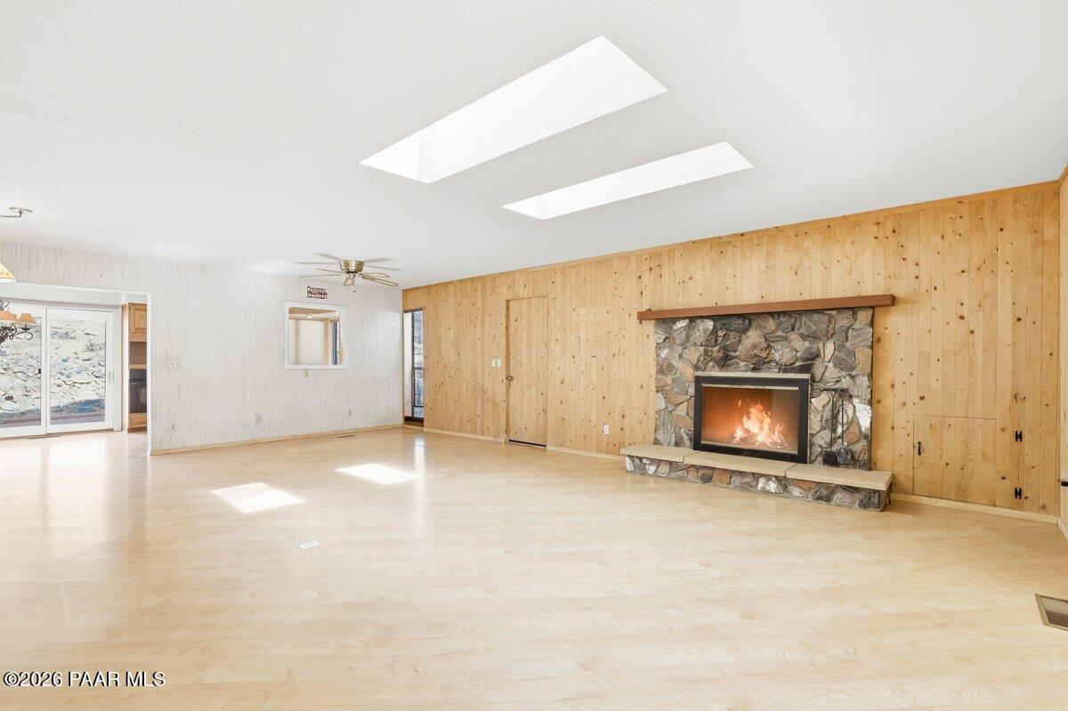 748 East Marapai Road Prescott, AZ 86303 - Photo 12 of 47 a view of an empty room with a fireplace