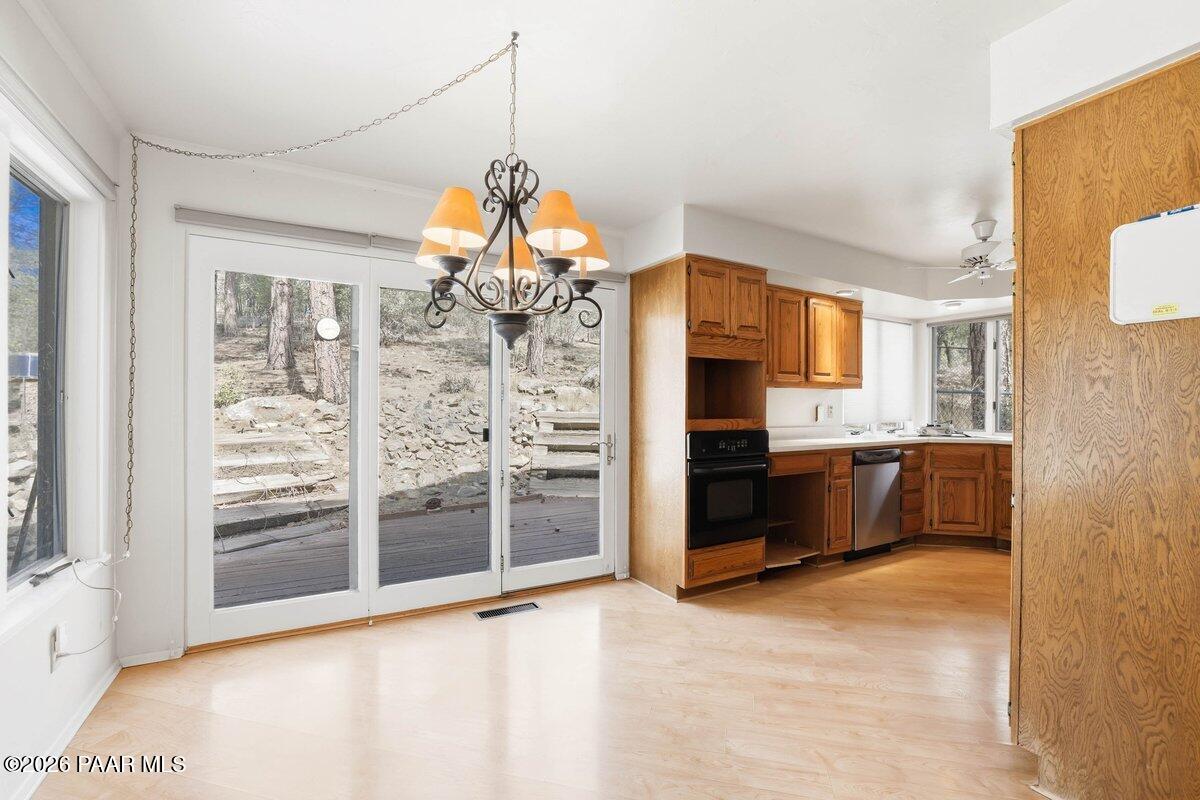 748 East Marapai Road Prescott, AZ 86303 - Photo 14 of 47 a view of a kitchen with a refrigerator and a sink