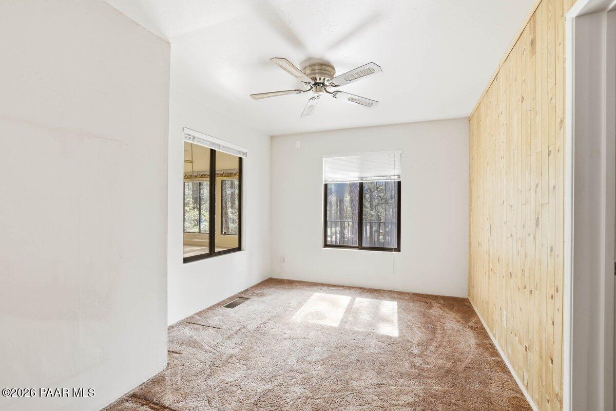 748 East Marapai Road Prescott, AZ 86303 - Photo 20 of 47 a view of an empty room and window