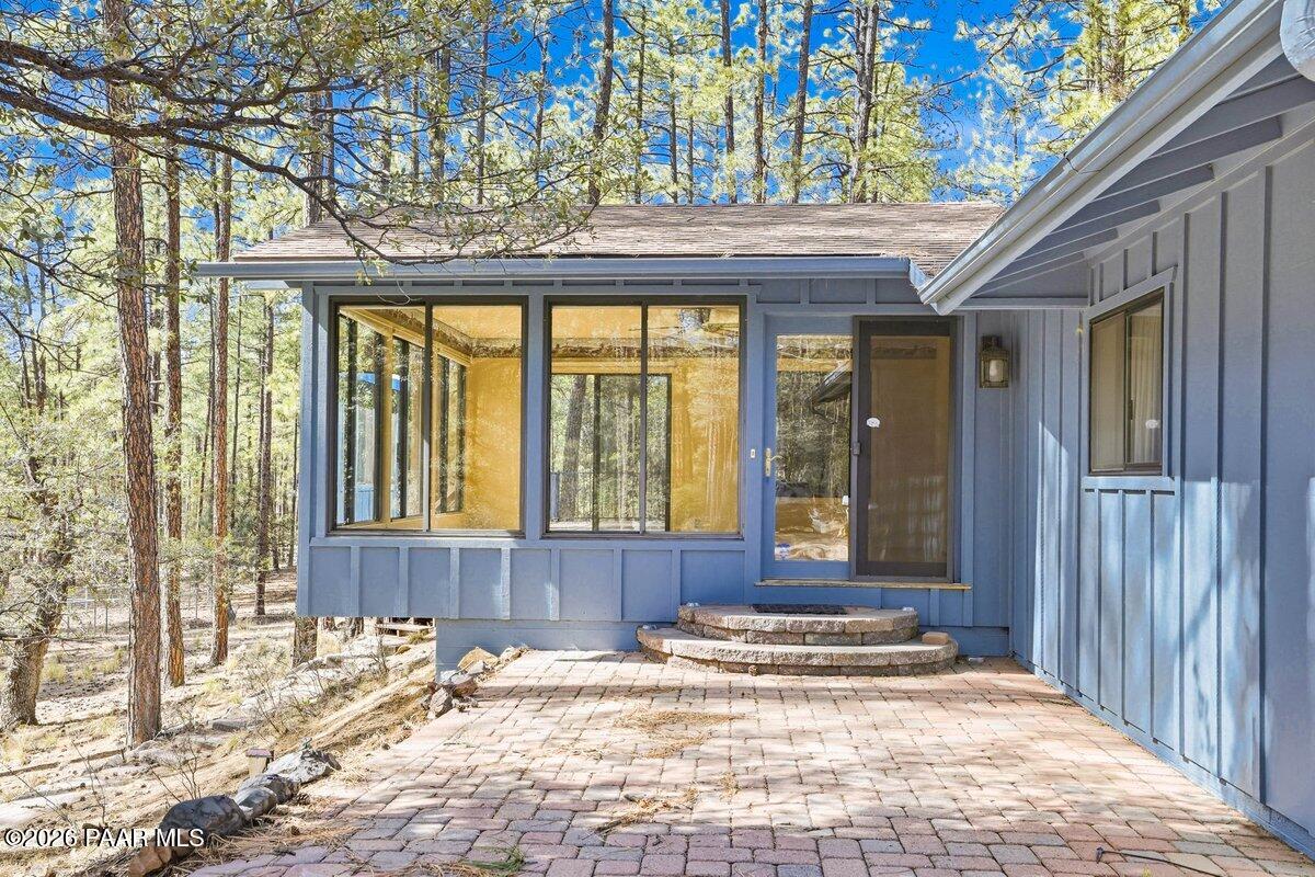 748 East Marapai Road Prescott, AZ 86303 - Photo 2 of 47 a view of a brick house with a outdoor space