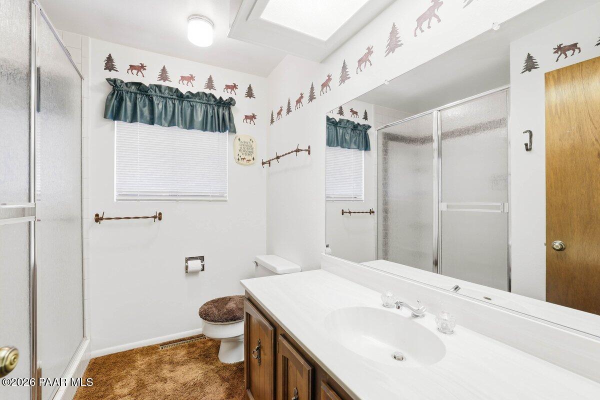 748 East Marapai Road Prescott, AZ 86303 - Photo 23 of 47 a bathroom with a sink a toilet and shower