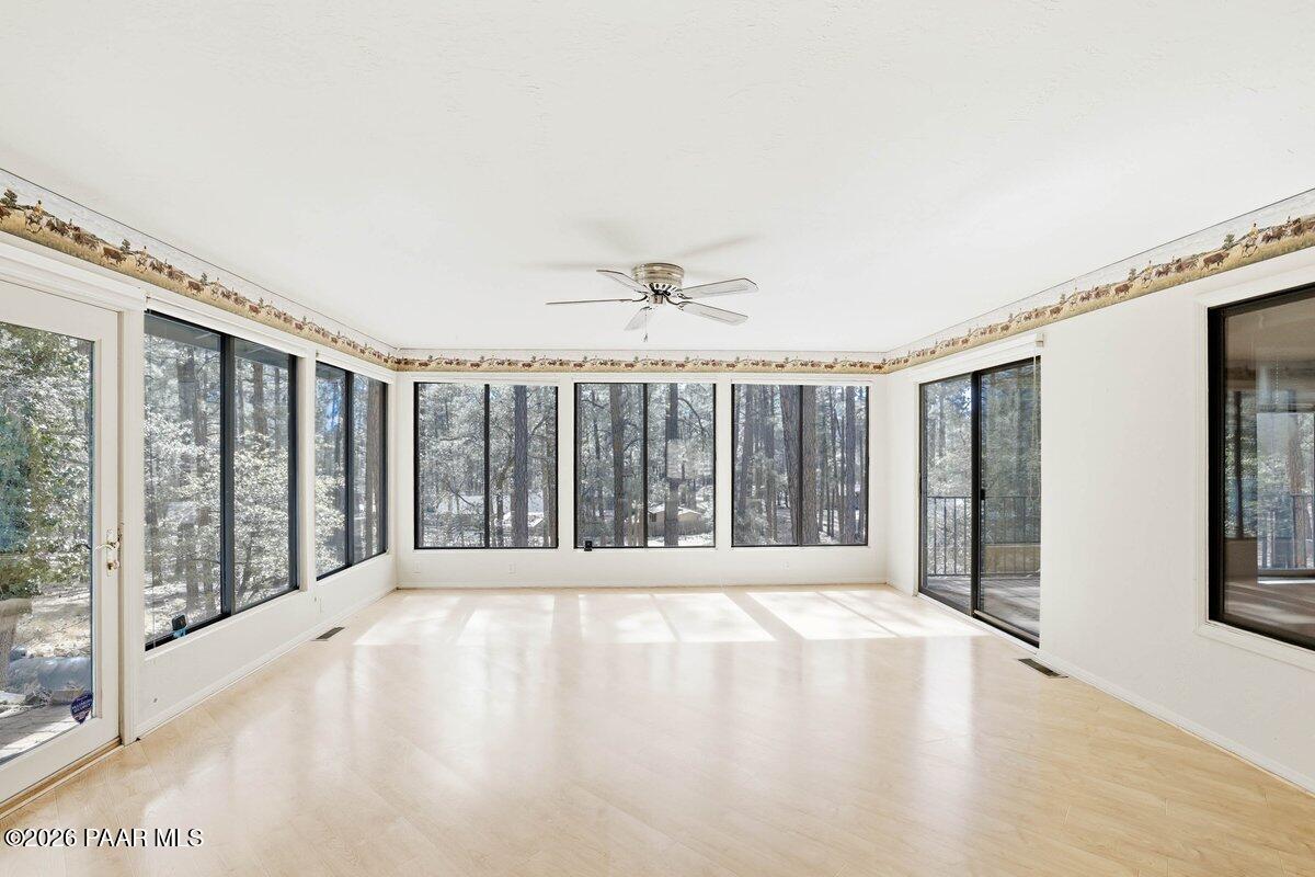 748 East Marapai Road Prescott, AZ 86303 - Photo 3 of 47 a view of an empty room with a window