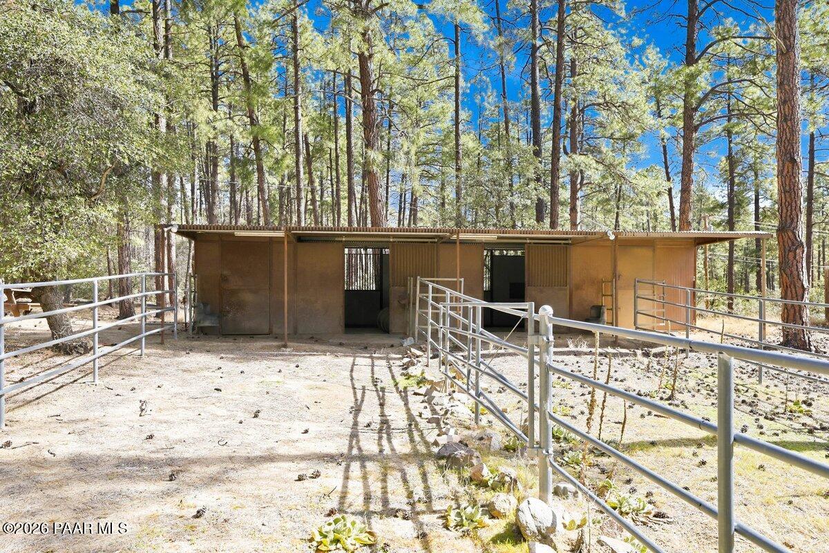 748 East Marapai Road Prescott, AZ 86303 - Photo 31 of 47 a view of a chairs and table on the terrace