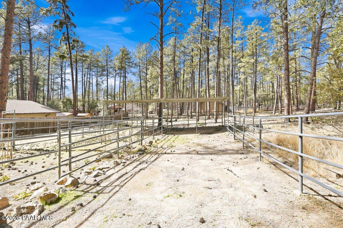 748 East Marapai Road Prescott, AZ 86303 - Photo 34 of 47 a view of a swimming pool with a lounge chairs