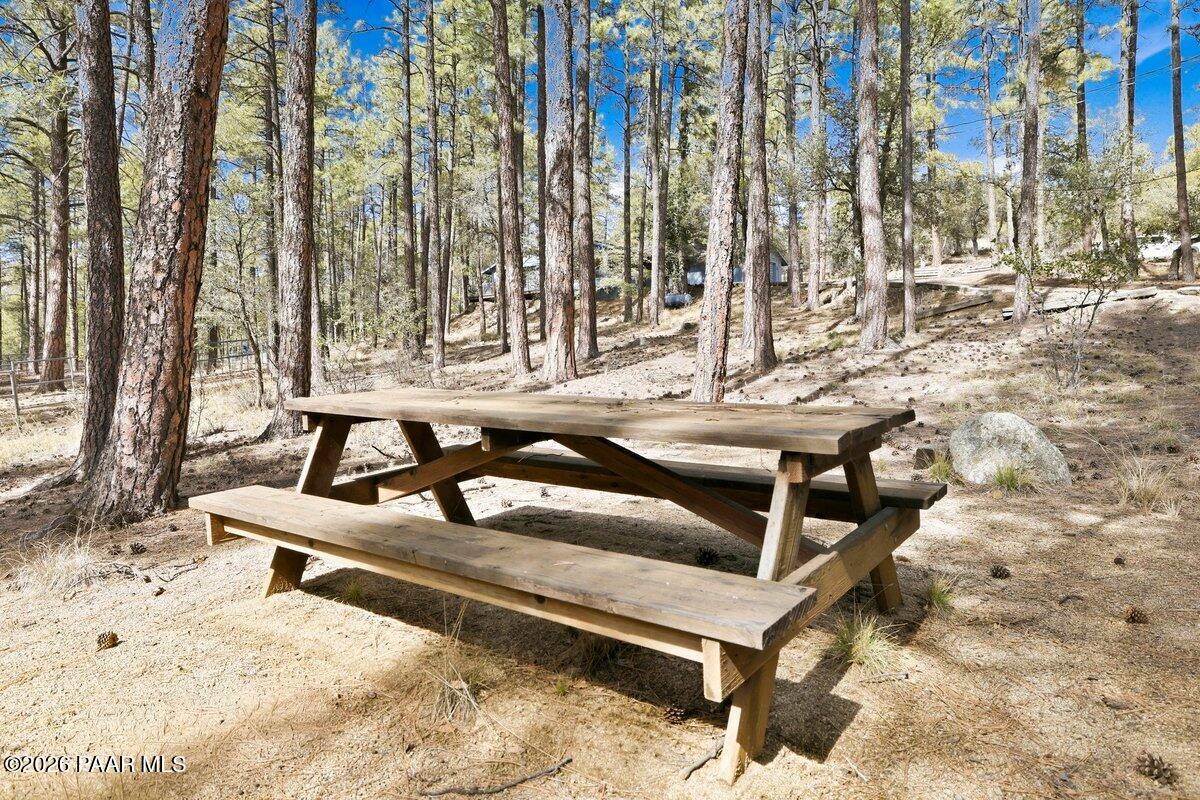 748 East Marapai Road Prescott, AZ 86303 - Photo 39 of 47 a view of a backyard with chairs