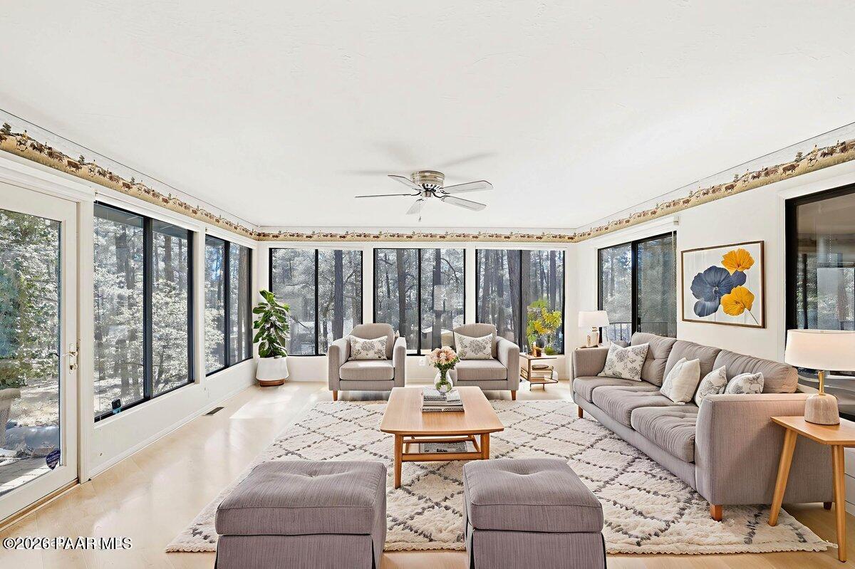 748 East Marapai Road Prescott, AZ 86303 - Photo 4 of 47 a living room with furniture and large windows