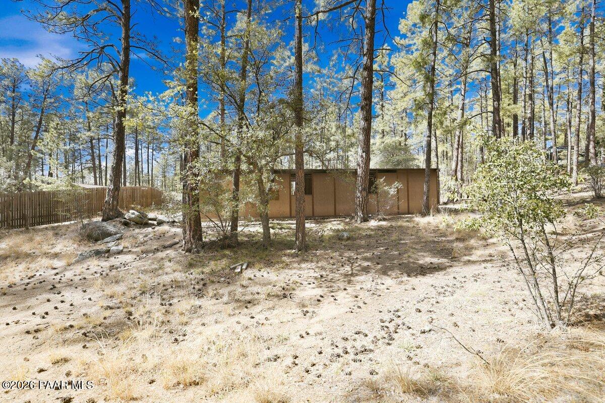 748 East Marapai Road Prescott, AZ 86303 - Photo 43 of 47 a view of a yard with a tree