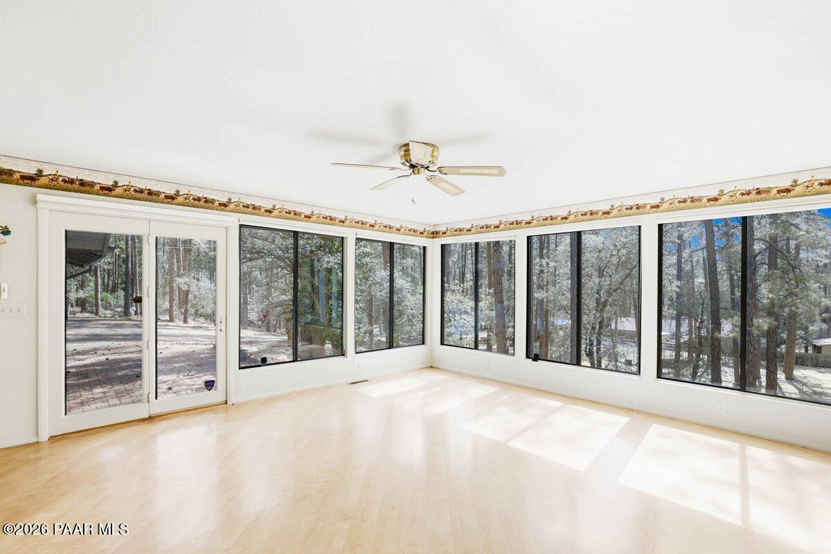 748 East Marapai Road Prescott, AZ 86303 - Photo 6 of 47 a view of an empty room with windows