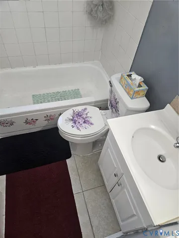 a bathroom with a sink and toilet