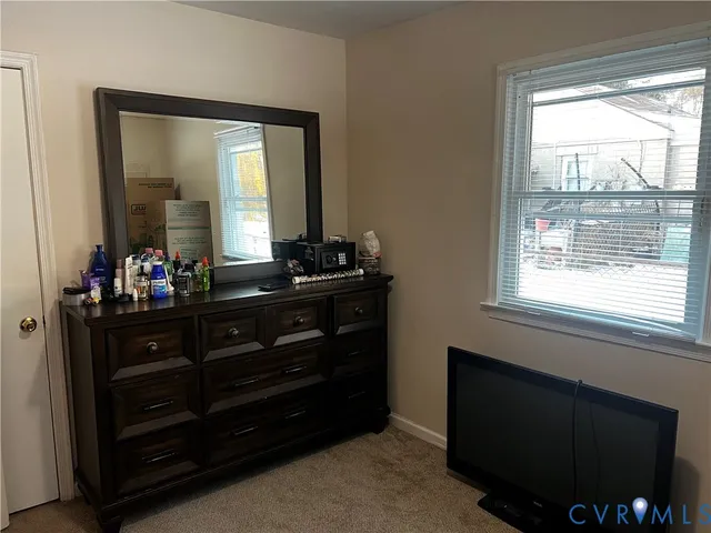 a bathroom with a sink a vanity and a mirror