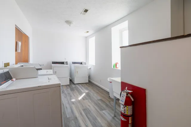 a view of a room with closet and windows