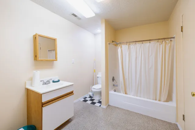 a room with an entryway and garage