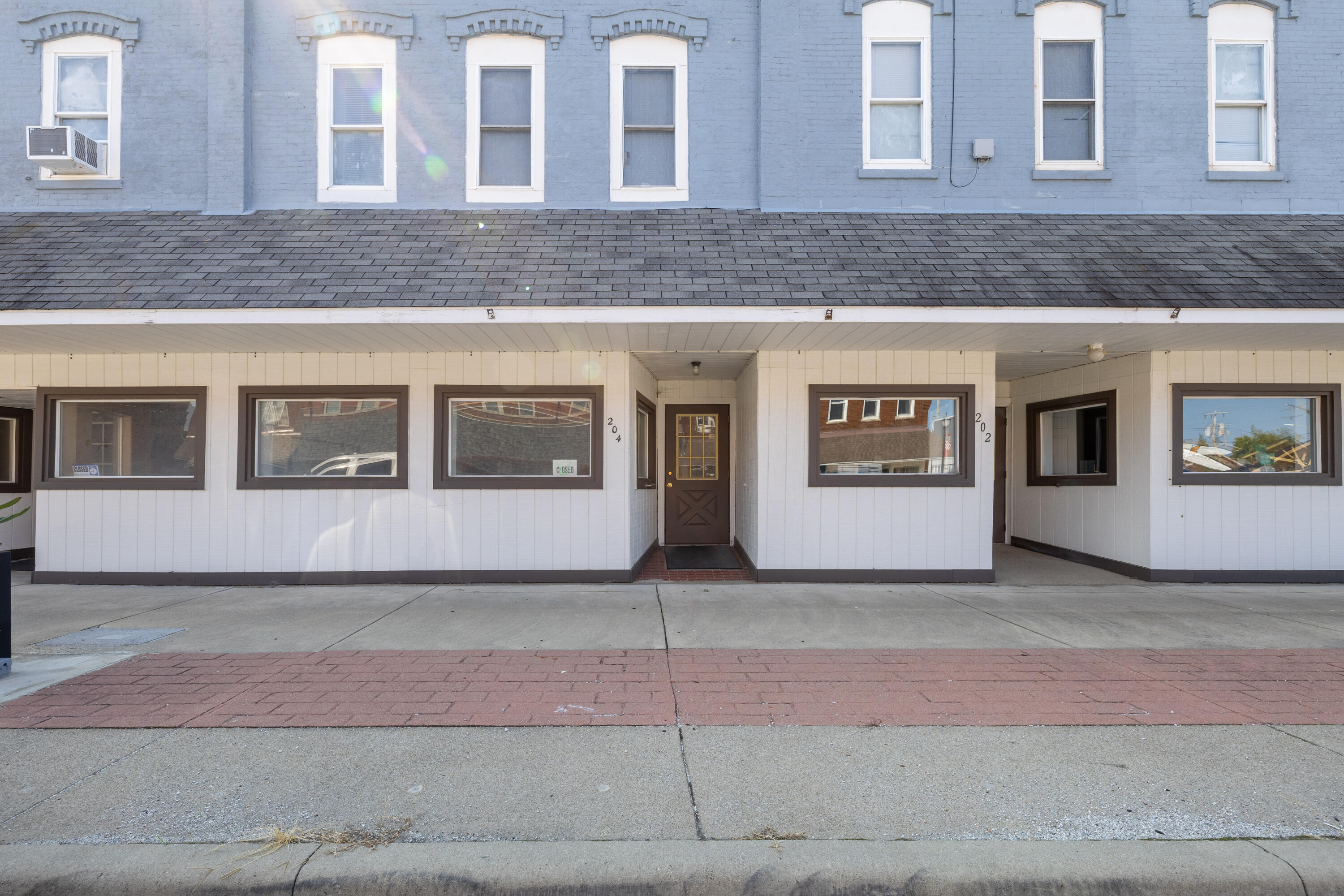 202 East 5th Street Fowler, IN 47944 - Photo 3 of 38 a front view of a house with windows