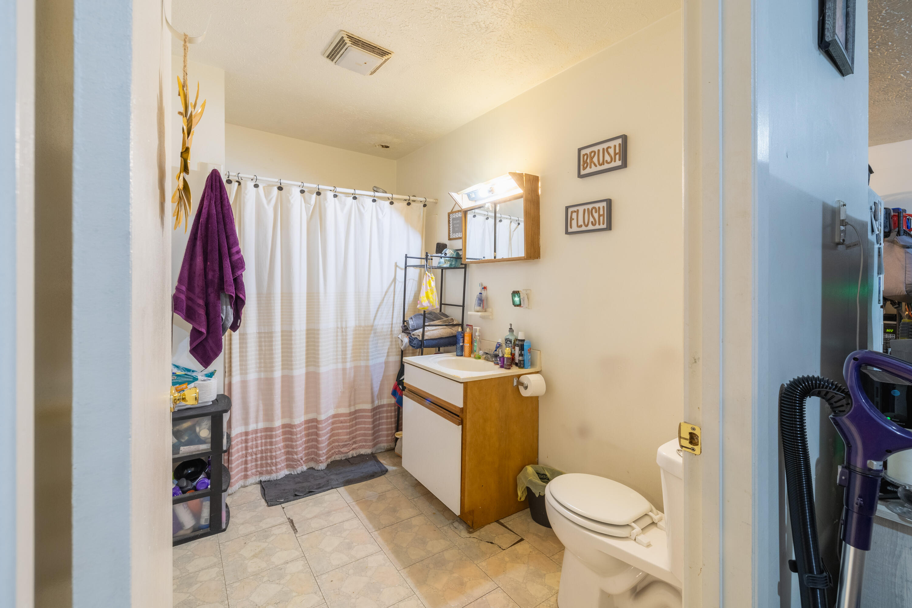 202 East 5th Street Fowler, IN 47944 - Photo 34 of 38 a bathroom with a toilet and a shower curtain