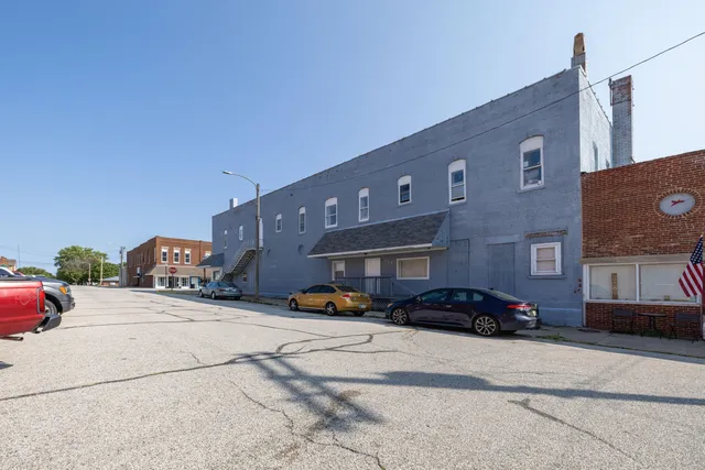 a car parked in front of a building