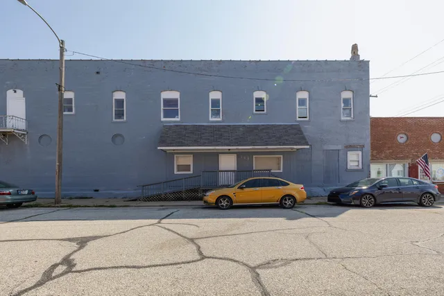 a car parked in front of a building