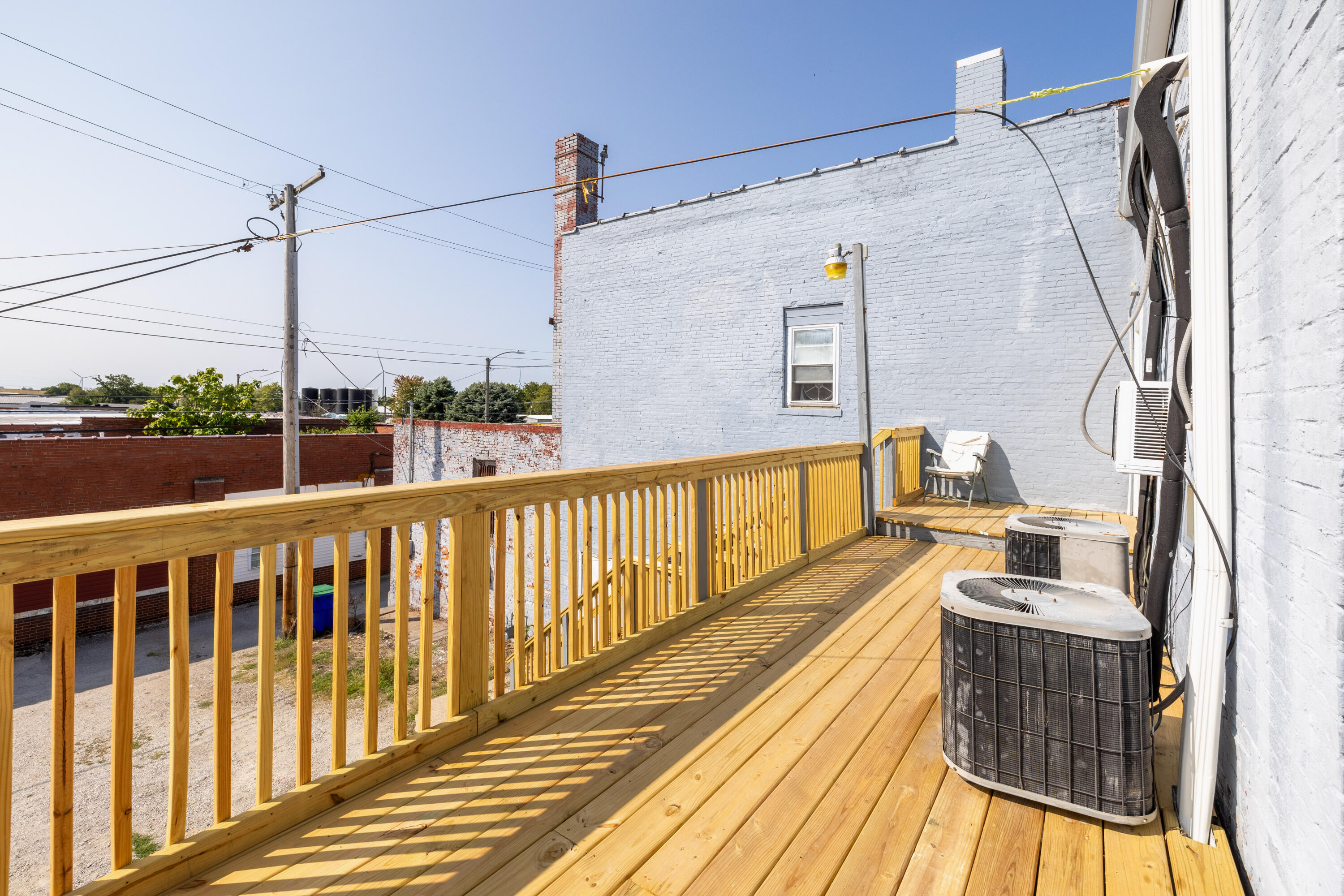 202 East 5th Street Fowler, IN 47944 - Photo 10 of 38 a view of a balcony with wooden floor