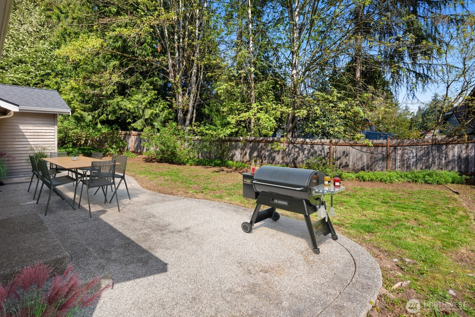 2831 166th Place Southeast Bothell, WA 98012 - Photo 15 of 25 a view of a backyard with sitting area