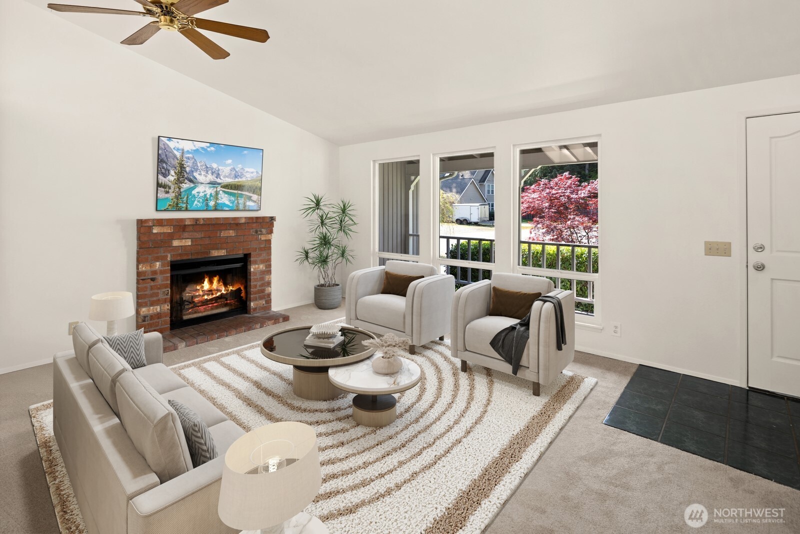 2831 166th Place Southeast Bothell, WA 98012 - Photo 4 of 25 a living room with furniture and a fireplace